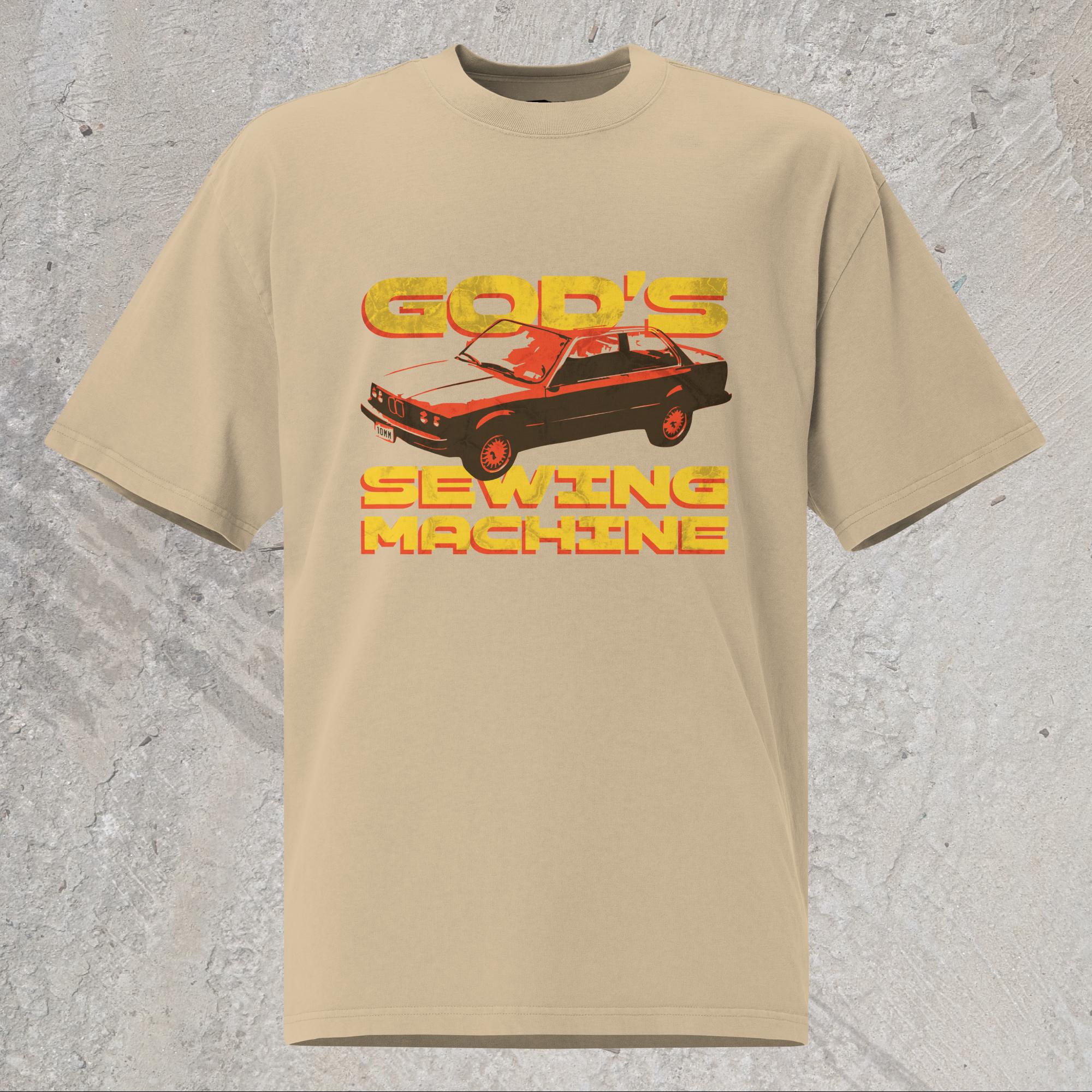 10mm funny car graphic khaki oversized T-shirt displaying BMW E30 with yellow text that reads “GOD’S SEWING MACHINE”