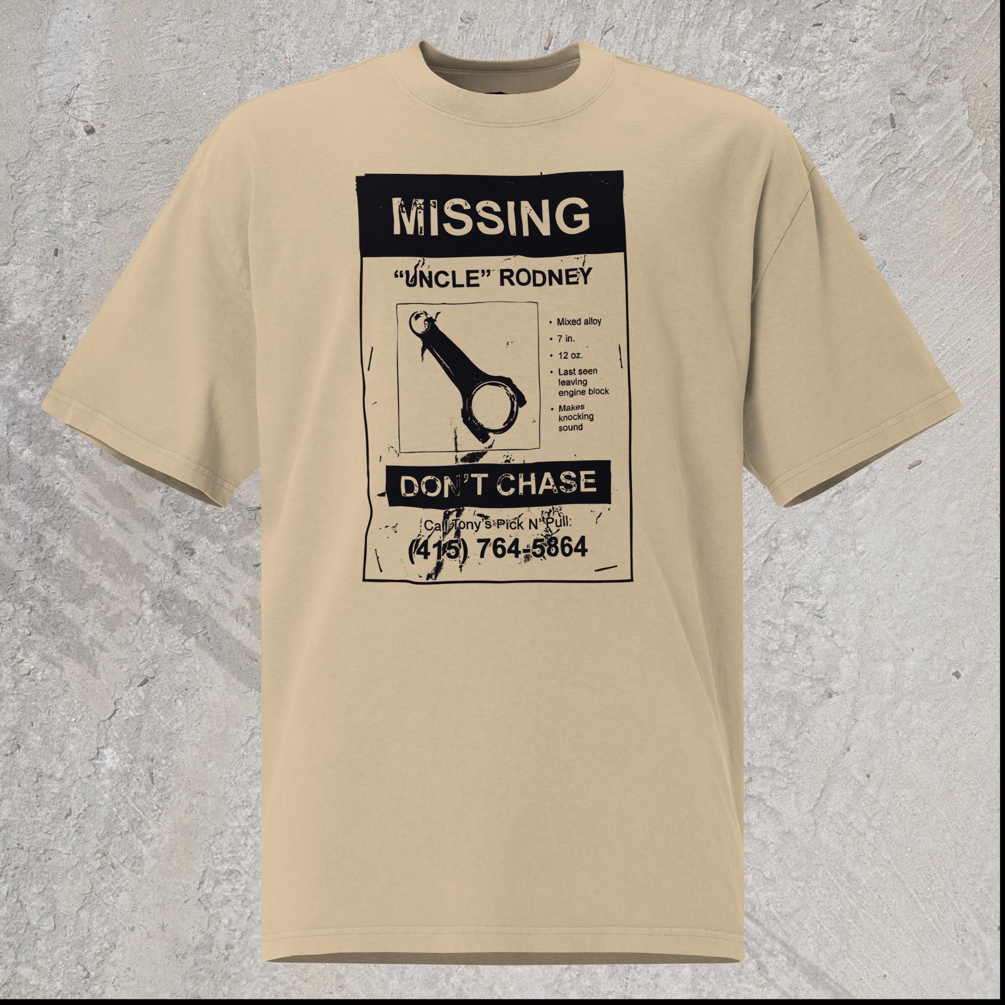 10mm funny car graphic khaki oversized T-shirt showing a lost pet flyer that reads “Missing: Uncle Rodney”, picture of connecting rod and details, “Don’t Chase” and phone number at bottom.