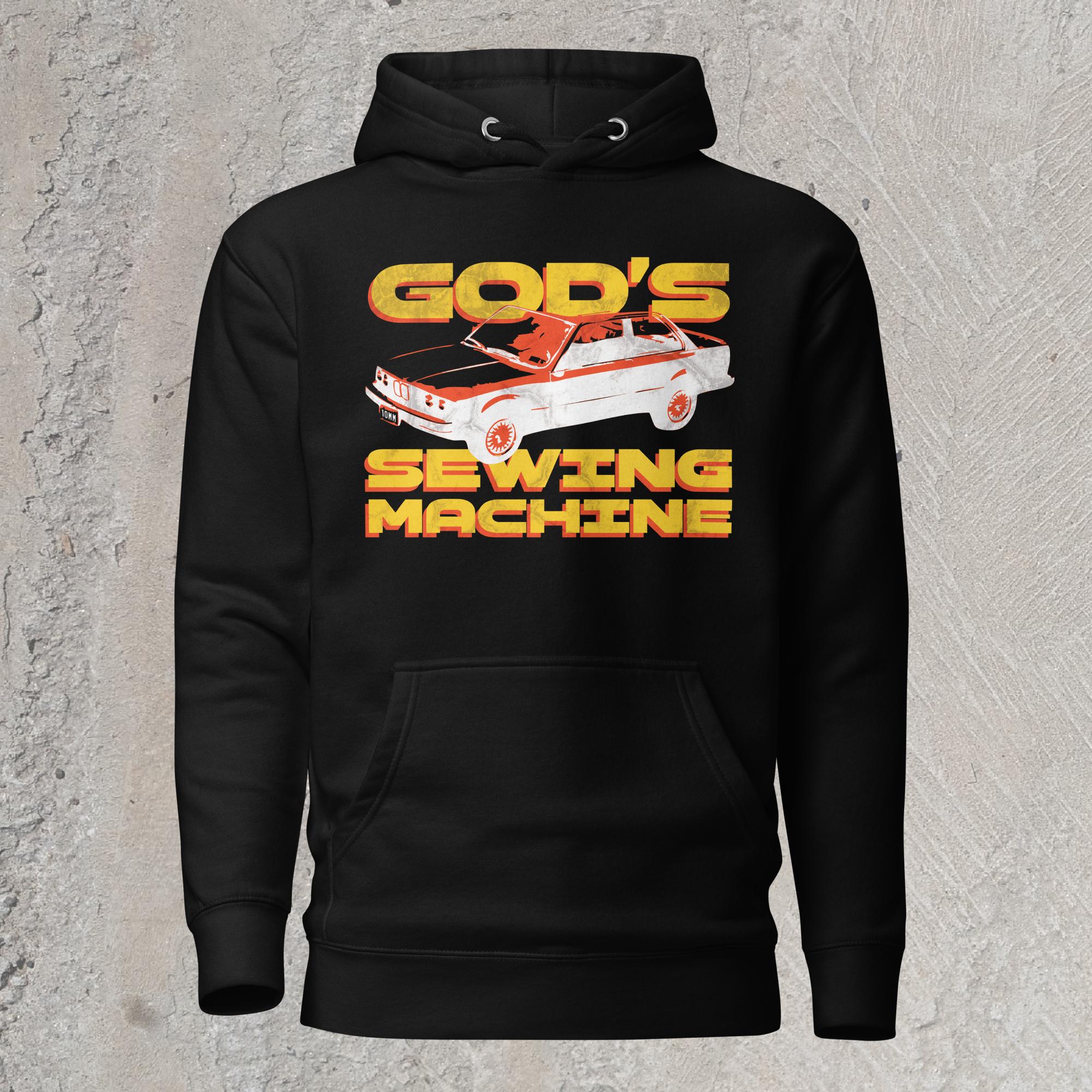 10mm funny car graphic black hoodie sweatshirt displaying BMW E30 with yellow text that reads “GOD’S SEWING MACHINE”