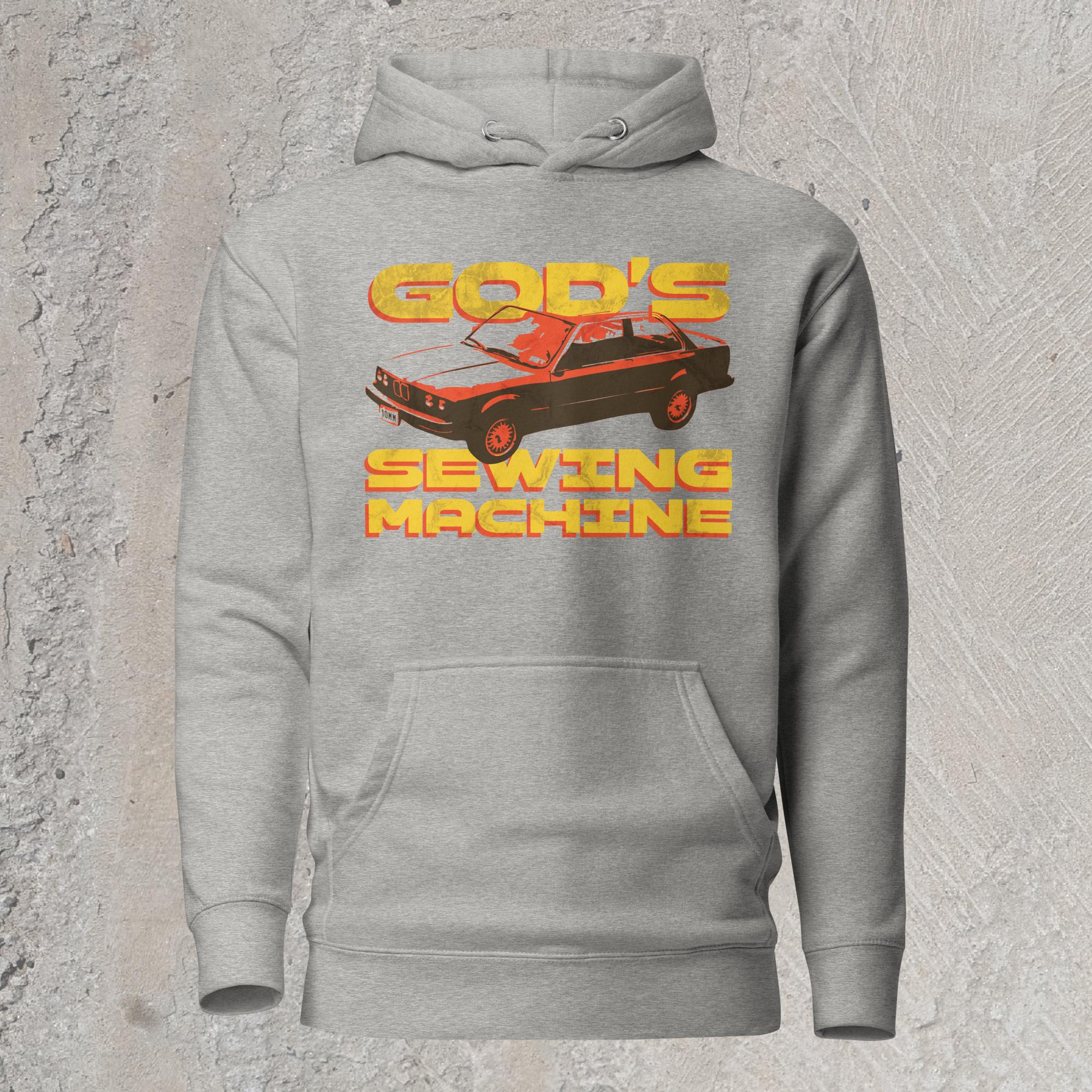 10mm funny car graphic gray hoodie sweatshirt displaying BMW E30 with yellow text that reads “GOD’S SEWING MACHINE”