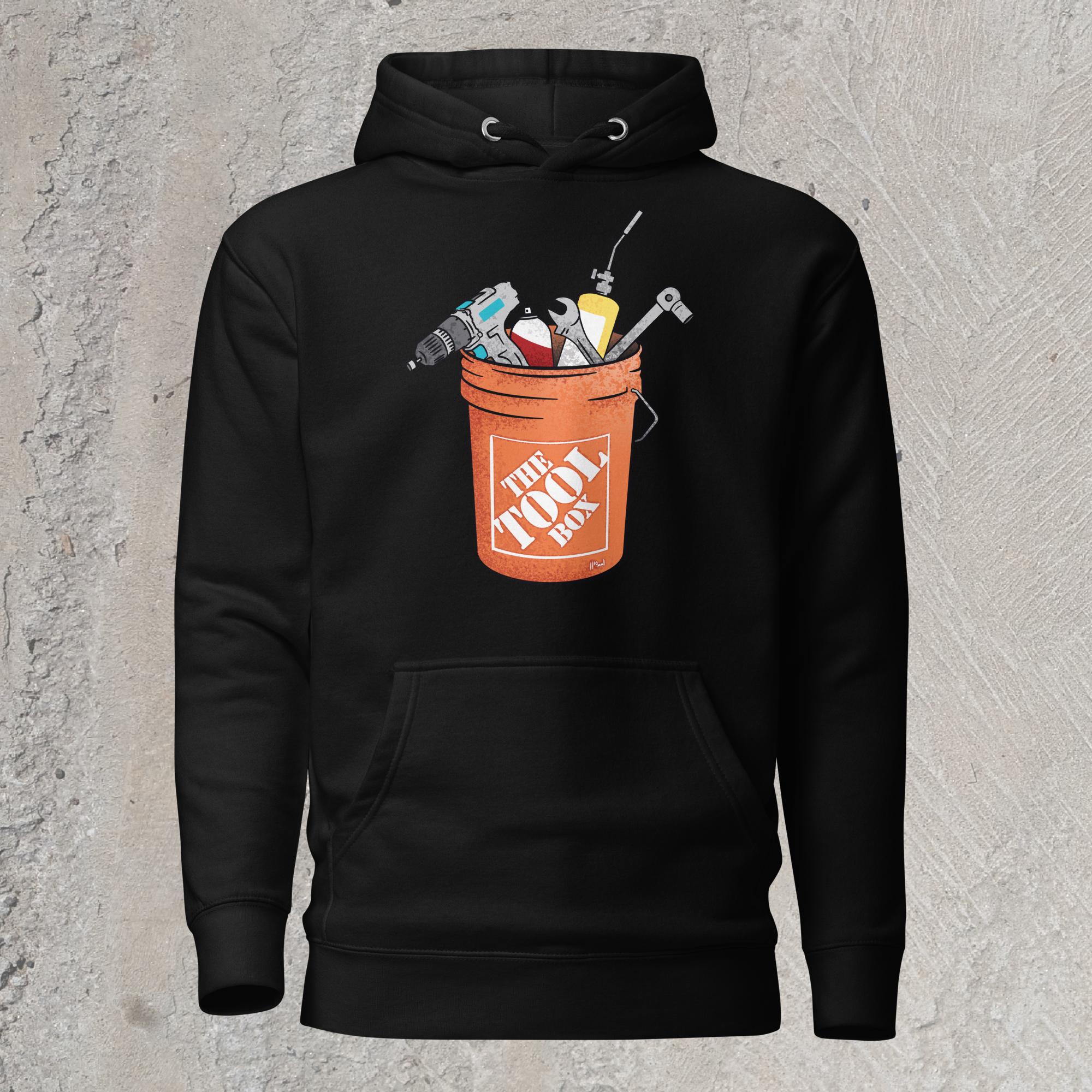 10mm funny graphic black hoodie sweatshirt with orange bucket full of tools for working on cars. Text on bucket reads “The Tool Box”
