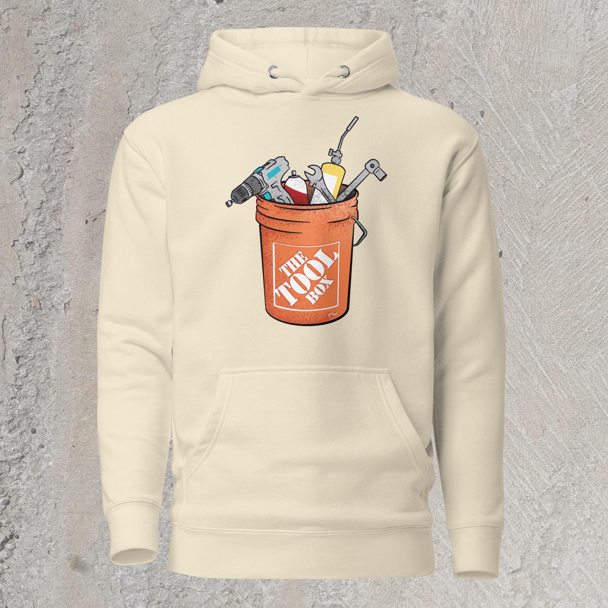 10mm funny graphic cream white hoodie sweatshirt with orange bucket full of tools for working on cars. Text on bucket reads “The Tool Box”