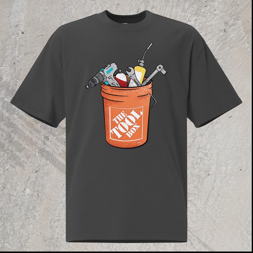 10mm funny graphic black oversized T-shirt with orange bucket full of tools for working on cars. Text on bucket reads “The Tool Box”