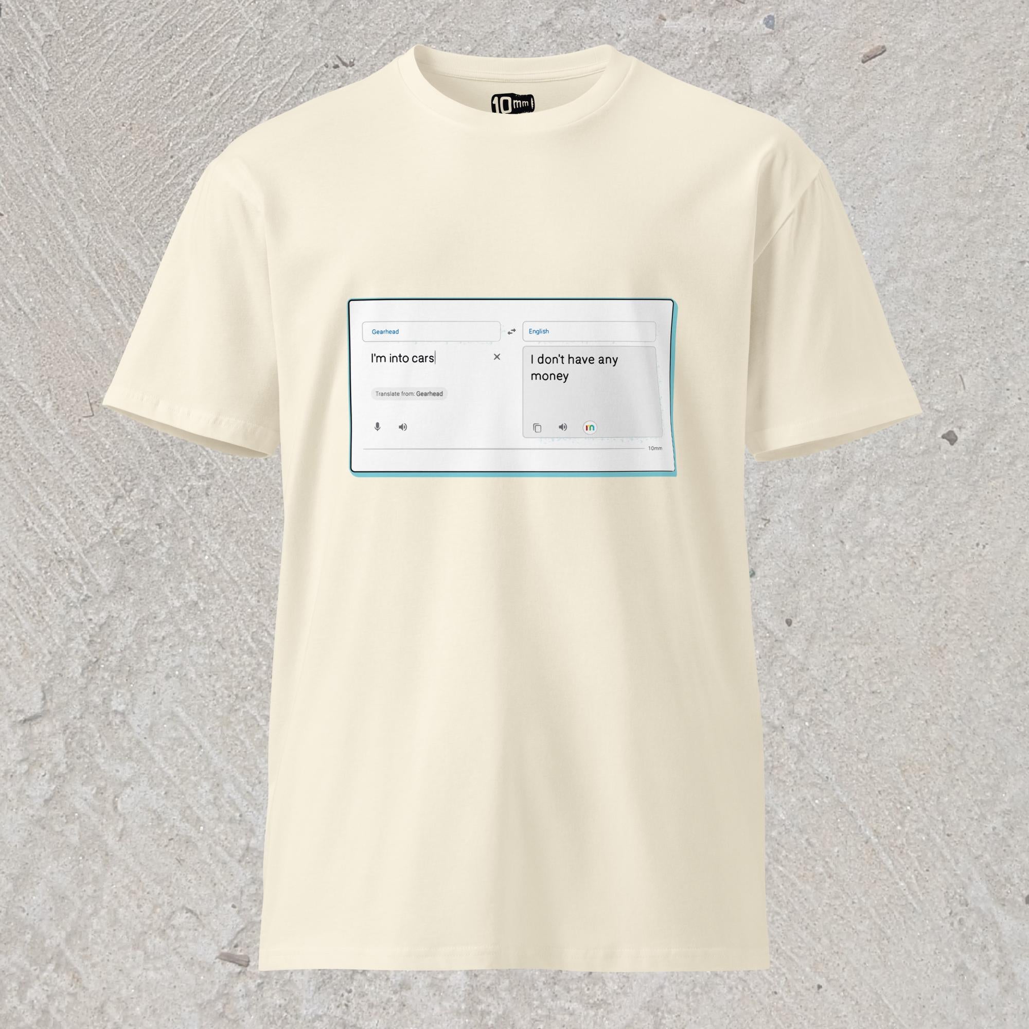 10mm funny graphic cream-colored T-shirt with online translator reading the phrase “I’m into cars” in gearhead language and translating to English as “I don’t have any money”