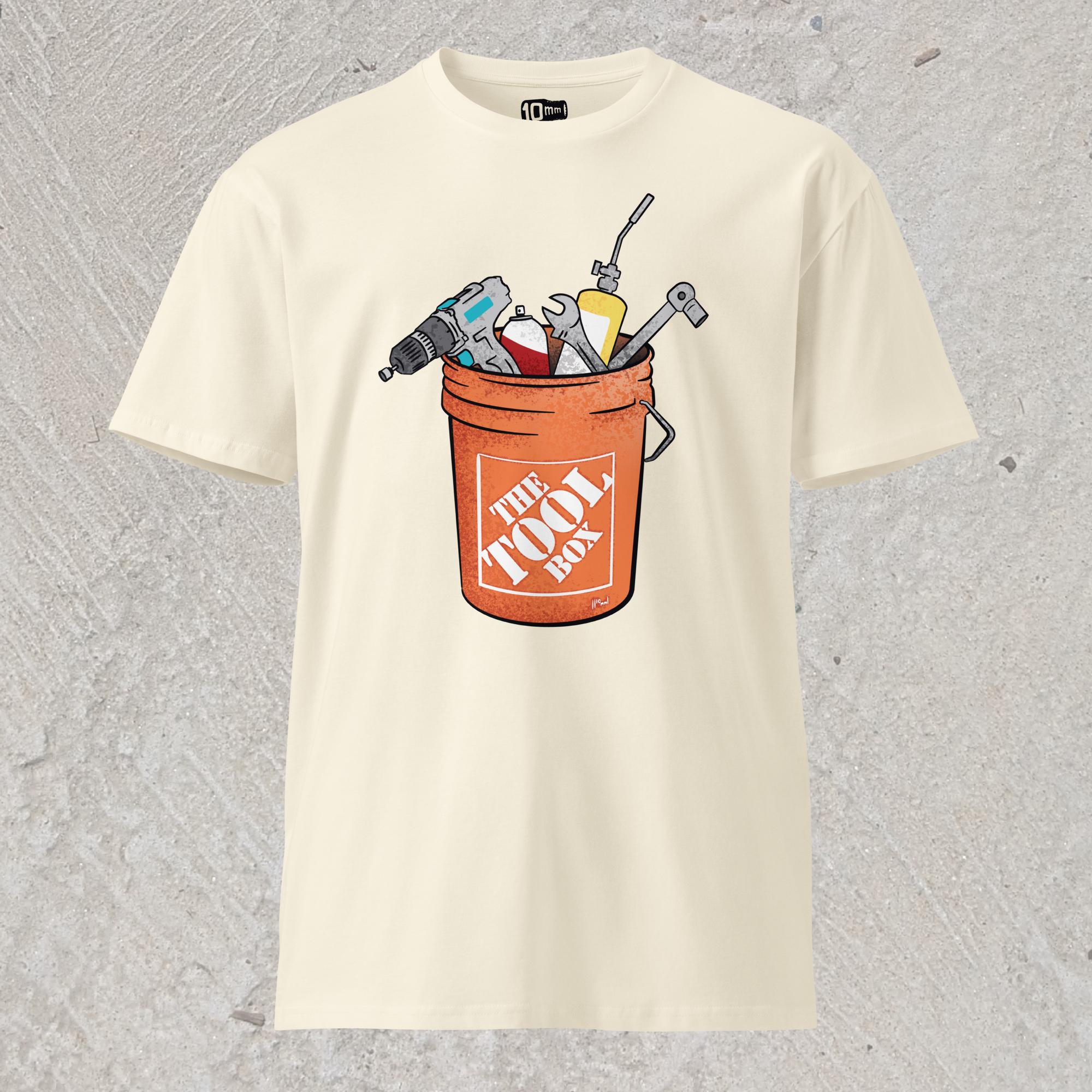 10mm funny graphic cream-colored T-shirt with orange bucket full of tools for working on cars. Text on bucket reads “The Tool Box”