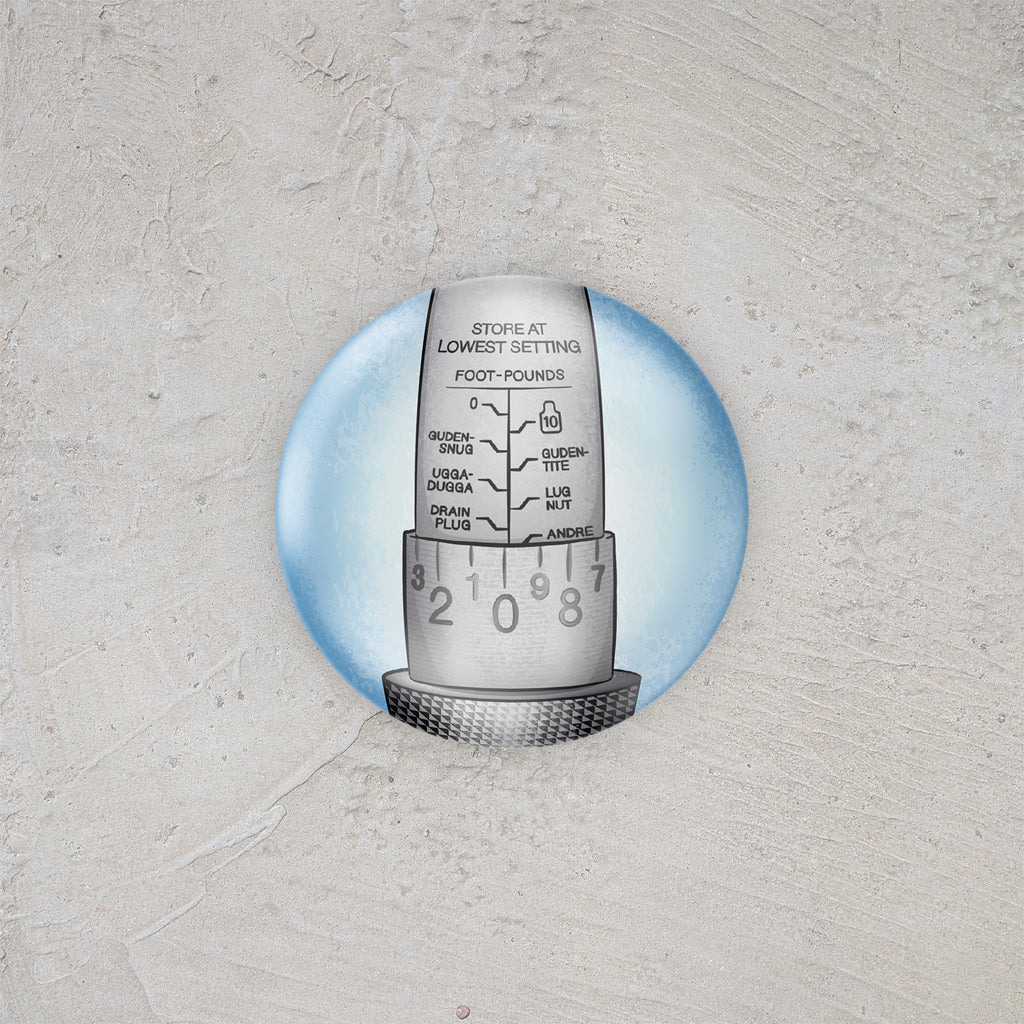Pin button with illustrated torque wrench on a textured gray background