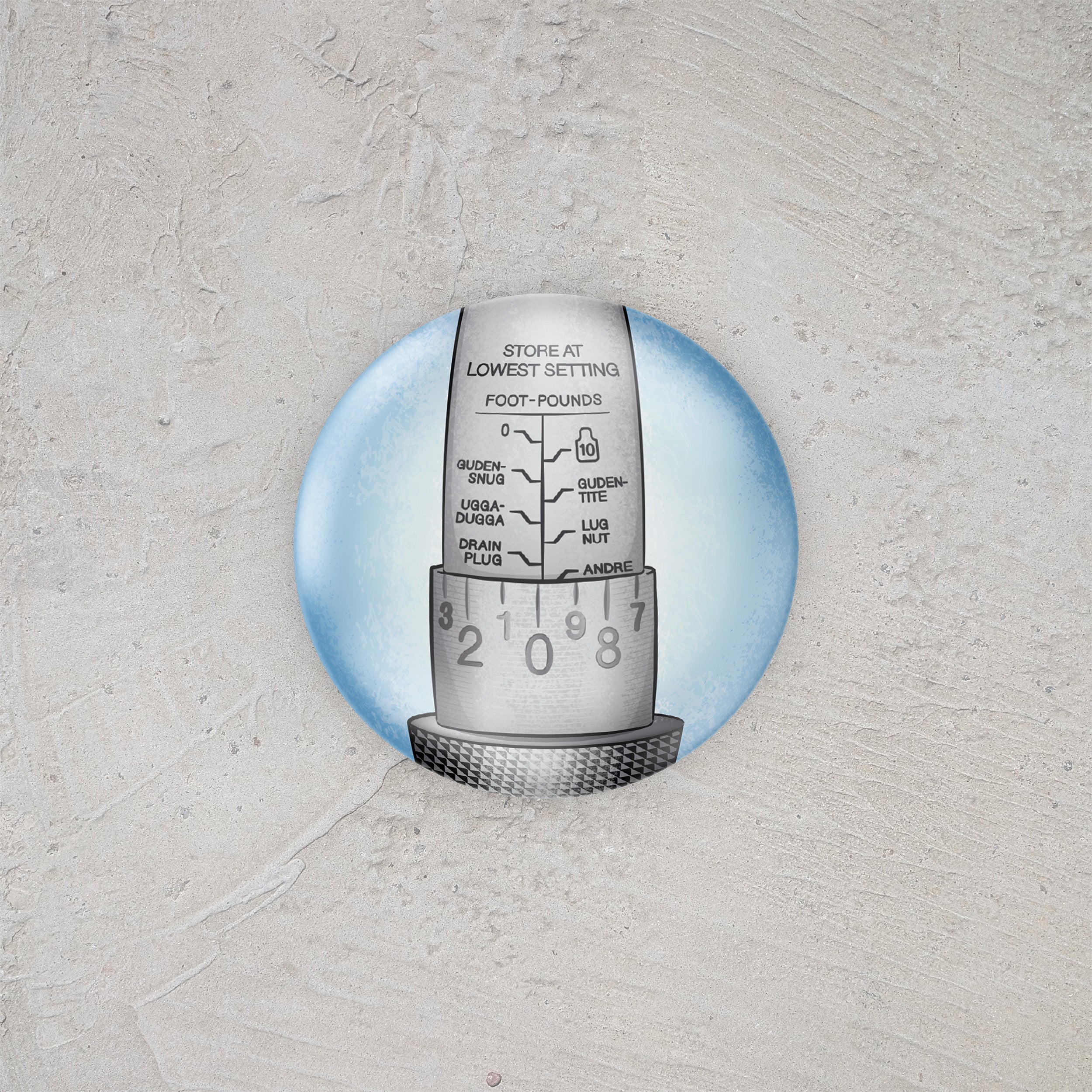 Pin button with illustrated torque wrench on a textured gray background